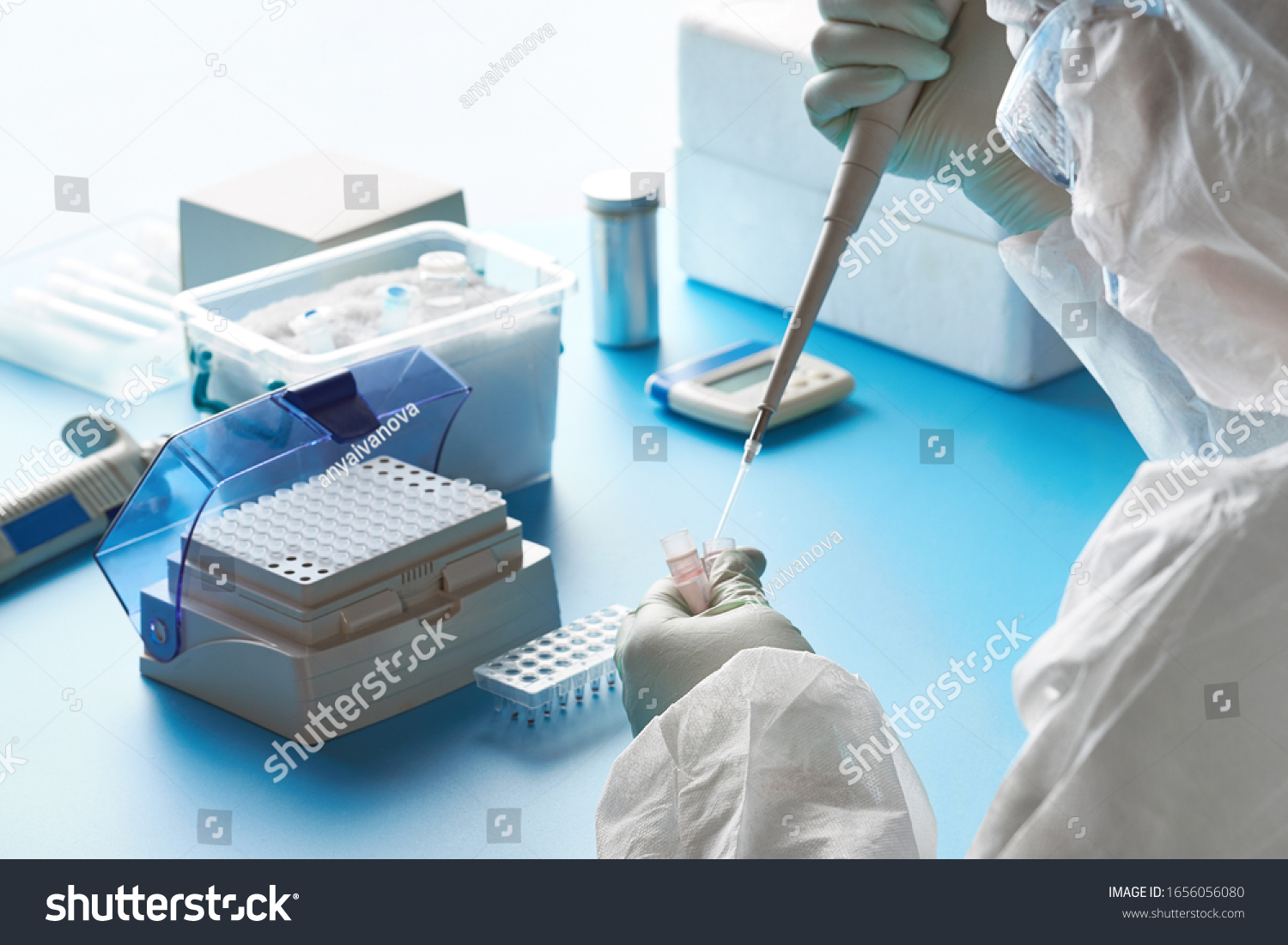 stock-photo-epidemiologist-in-protective-suit-mask-and-glasses-works-with-patient-swabs-to-detect-specific-1656056080