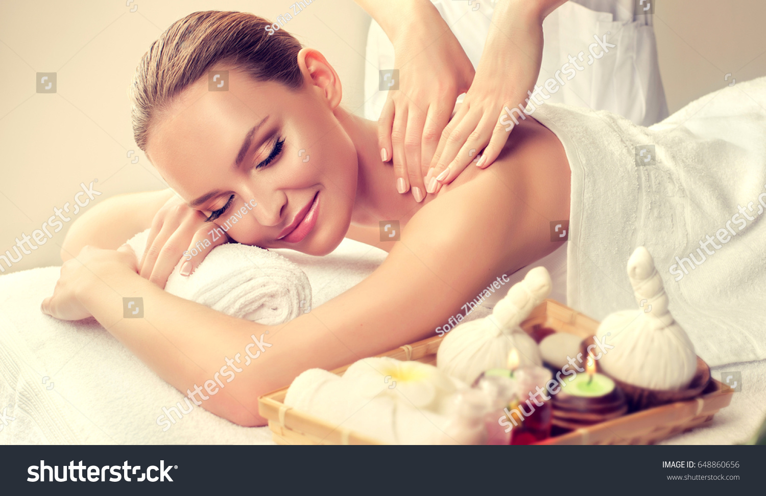 stock-photo-massage-and-body-care-spa-body-massage-woman-hands-treatment-woman-having-massage-in-the-spa-648860656